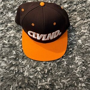 Orange and Brown CLVLND Cap.